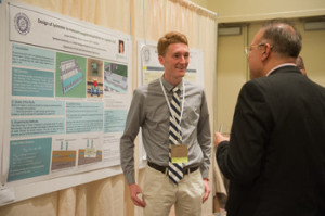 Undergraduate Joey DiStefano presenting his poster on lysimeter design for the OnCenter green roof